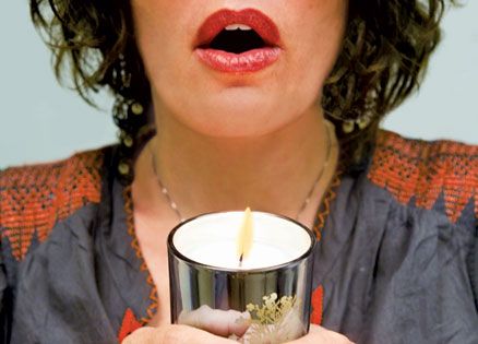 Picture of woman holding a candle