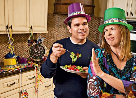 Michael Thompson tries to sway his wife Stephanie to try some black-eyed peas.