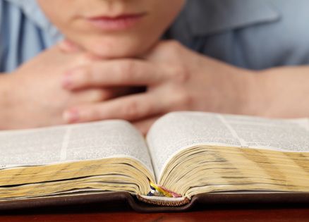 Woman reading the Bible