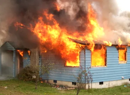 house engulfed in flames