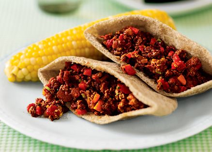 A pair of Pita Joes, with an ear of corn on the side