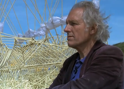 Artist Theo Jansen in front of his kinetic sculpture