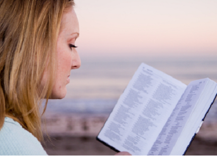 Woman reading the Bible