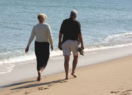 Couple strolling on the beach