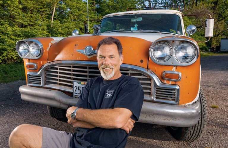 John Kirsten with his orange and white Checker