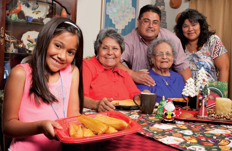 Bernice (in red) with grandniece Laura, mom Paz & Laura’s parents Rene & Isabel