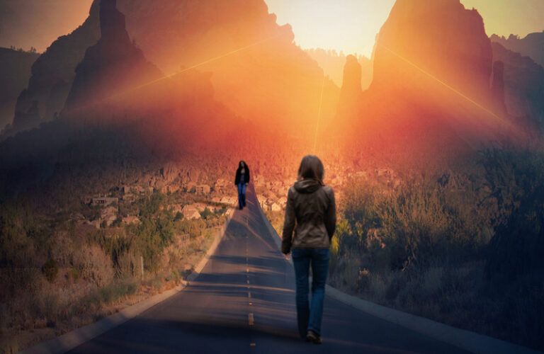 Two women meeting on a mountain road