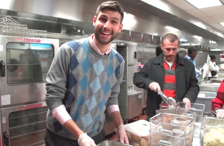 Ben Simon, founder of Food Recovery Network, and students boxing up food