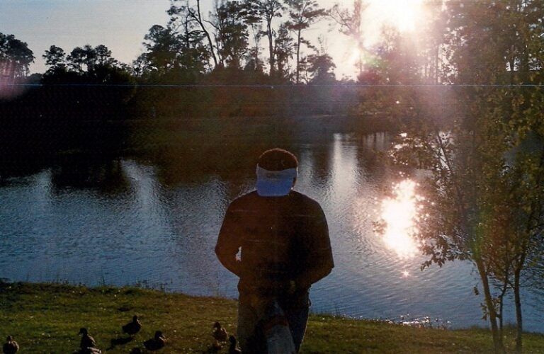 A beautiful image of an angel as a reflection on the water