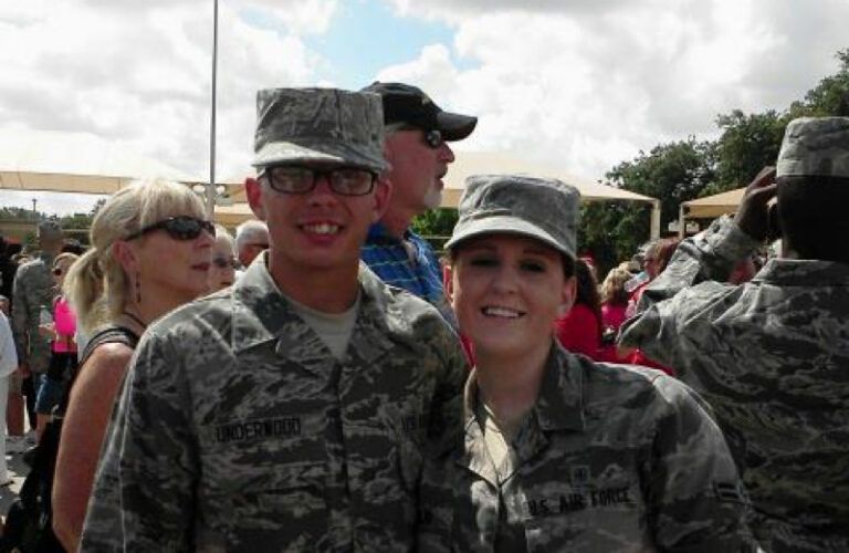 Two young smiling soldiers