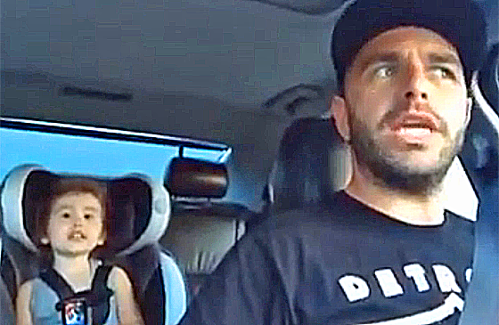 Daughter sings "Let It Go" together with father.