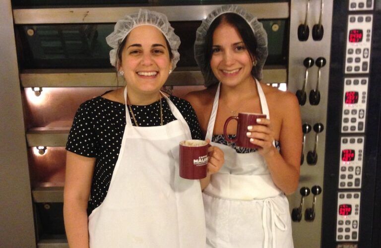 Diana and her sister Kristin wait for the bread to bake.