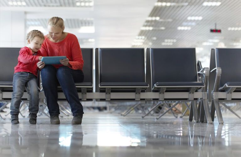 Mother and son at the airport