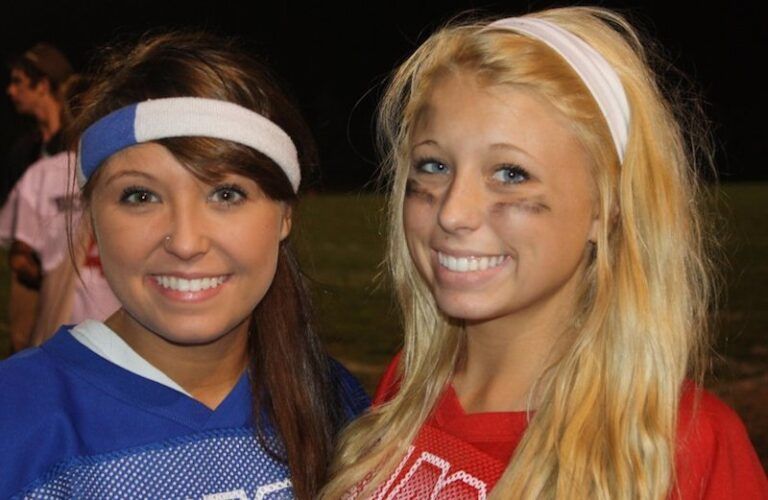 Michelle Adams's daughters in a Kodak moment at powder puff football game.