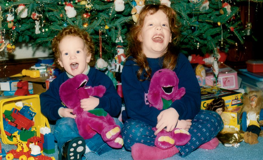 Kids under the tree at Christmas