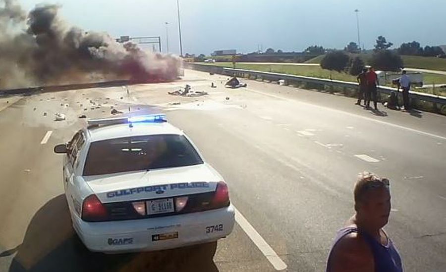 David Fredericksen rushes to help a woman and a child trapped in a burning car.