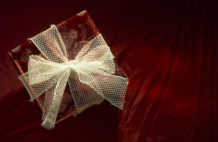 Gift giving and prayer go together. Photo Hemera Technologies, Thinkstock.