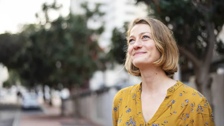 Woman looking up and thinking of things to do during lent