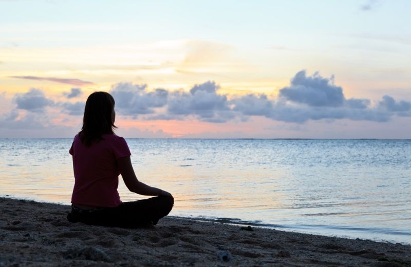 Woman praying. Shutterstock