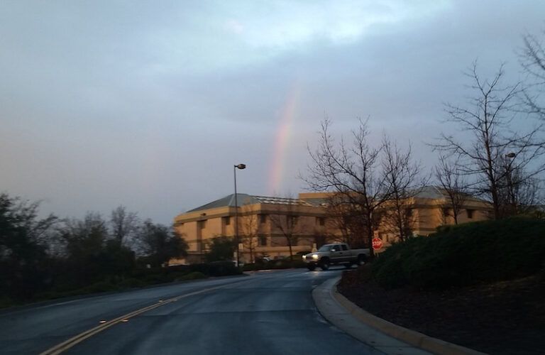 Rainbow over the hospital. Photo by Seanmwhisler posted on Reddit.