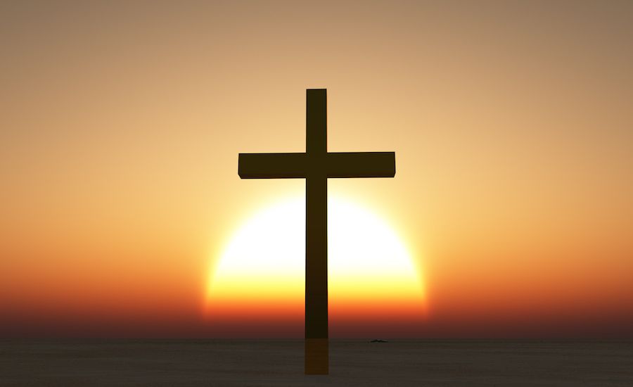 Cross at dawn. Thinkstock.