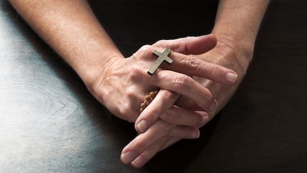 A mother prays for a miracle for her daughter.