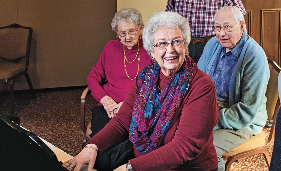 Marilynn leads fellow Homestead residents in song.