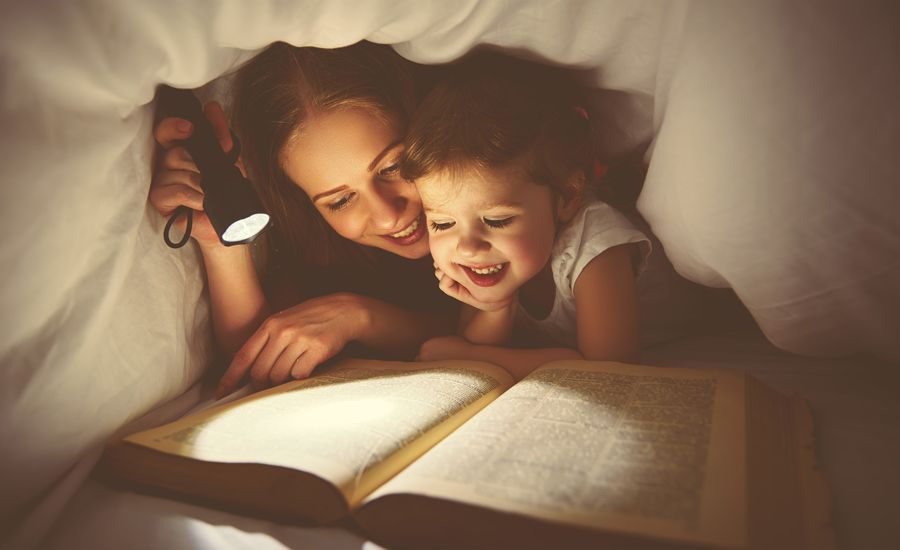 mother and daughter reading