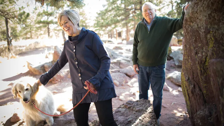 Carol and Lynn Kuykendall with their golden retriever, Kemo