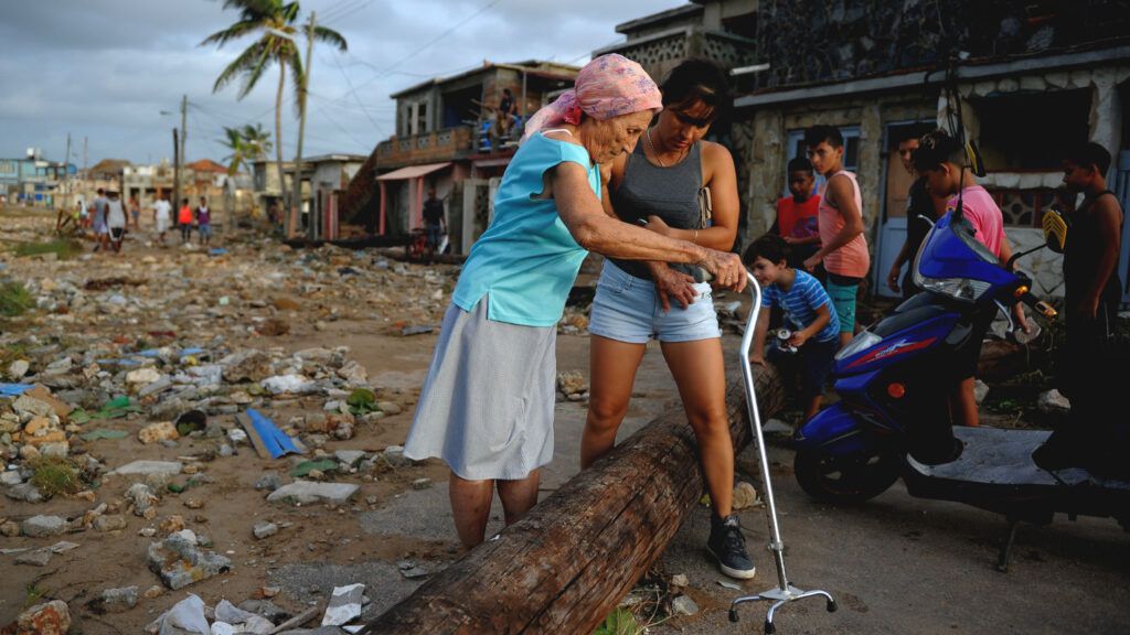 ubans recover their belongings after the passage of Hurricane Irma