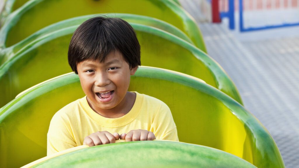 Boy on a roller coaster