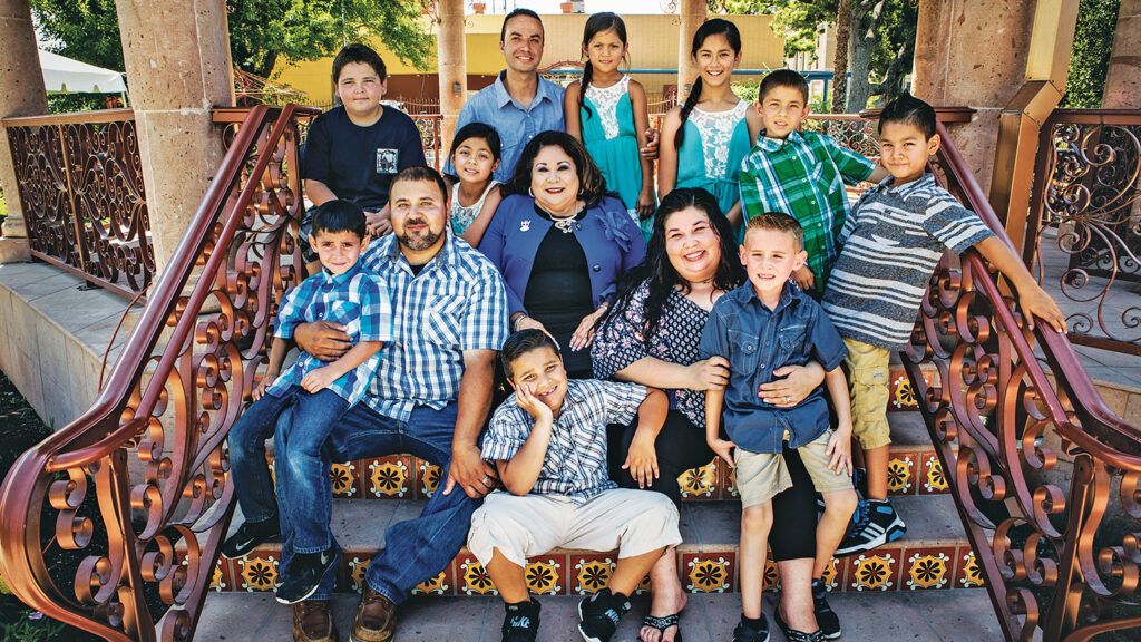 Lisa’s family has really grown! That’s her in the middle, surrounded by two of her children, a son-in-law and the grandchildren. Five of those grandchildren were adopted through the Angels of Grace program.