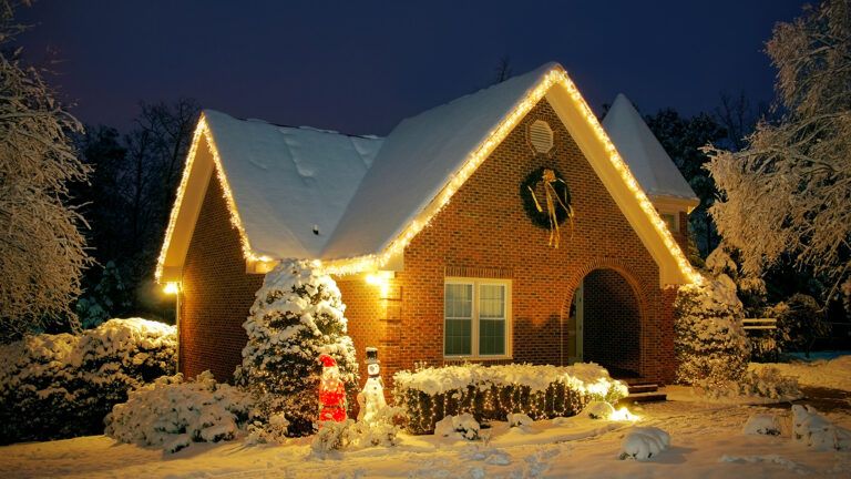 A house festooned with Christmas lights