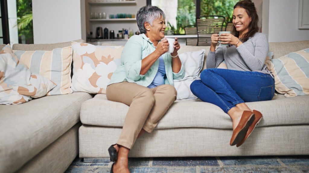 adult_child_talking_to_mom_on_couch