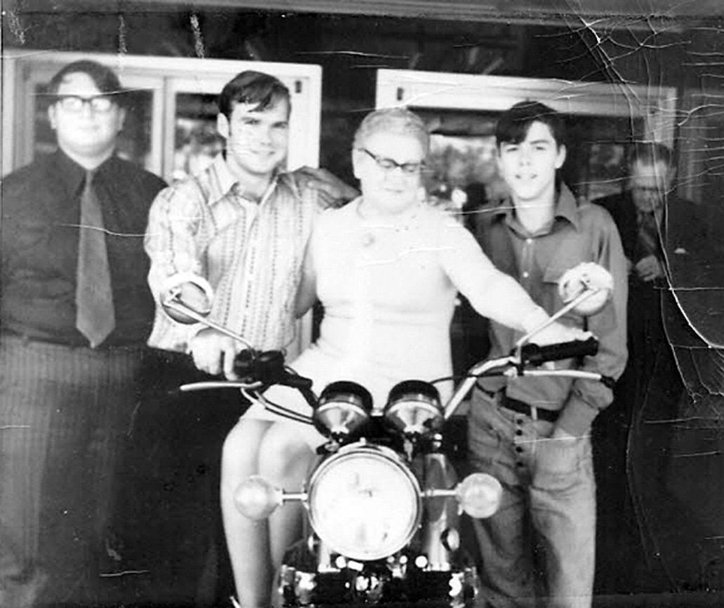 Rosemary's mother on a motorcycle with Robert at her side