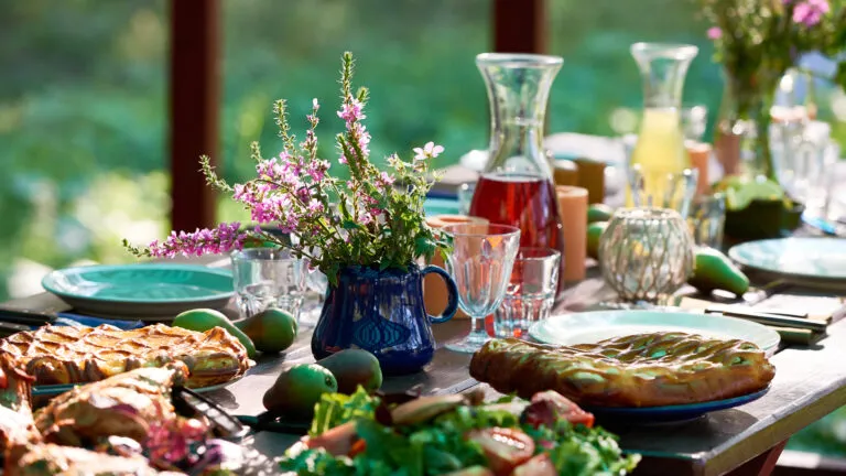 Festive table with food and drinks on it