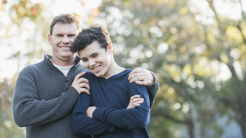 A father celebrating his teen son during the Lent season