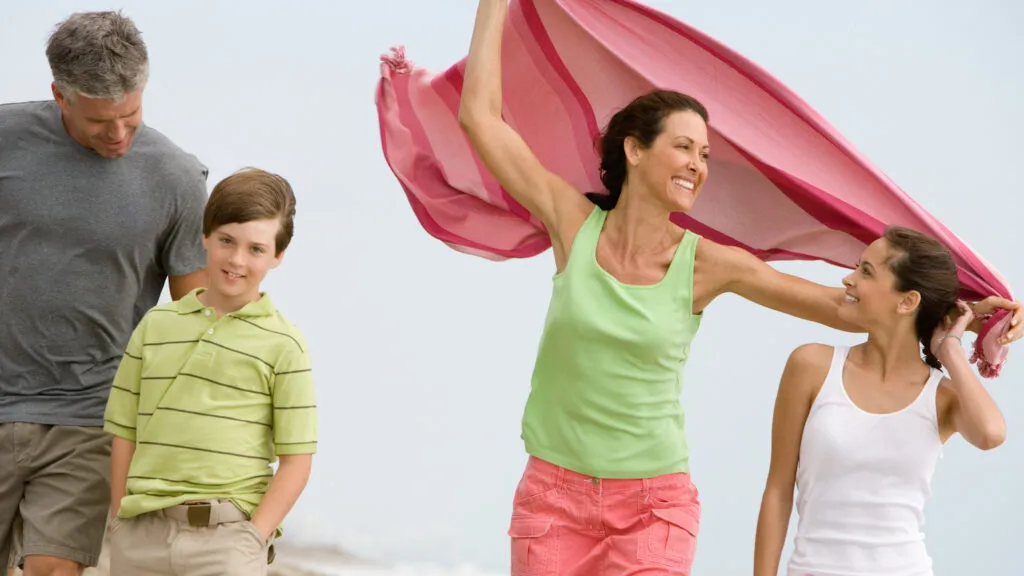 Family walking on the beach