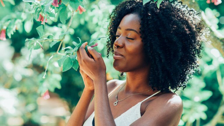 smelling_flowers