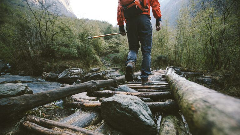 A hiker on a rocky trail