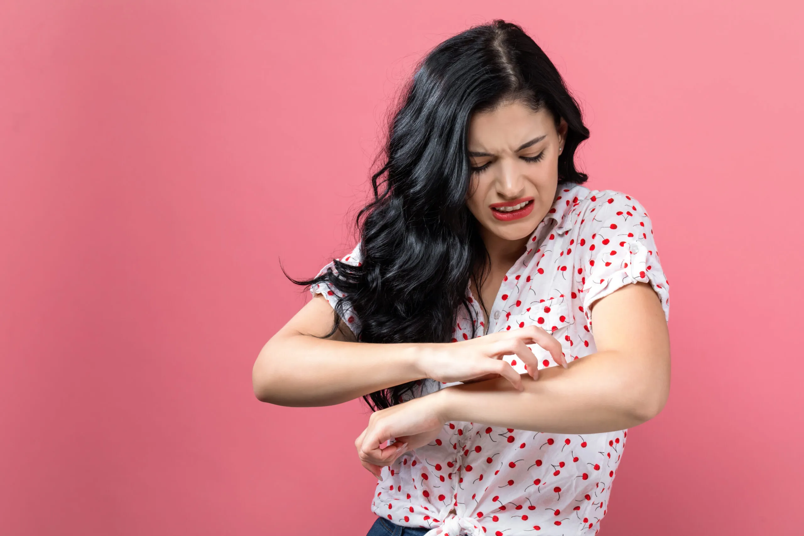 Woman scratching