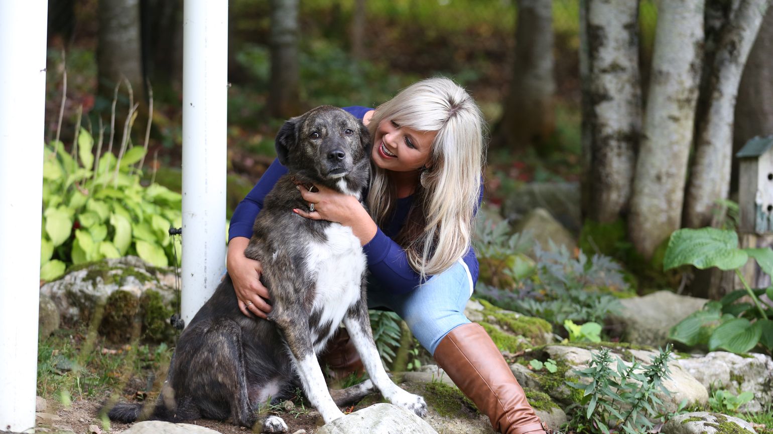 Anna and Bear in a loving embrace.