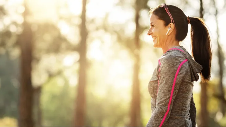 A woman taking her daily walk outdoors.