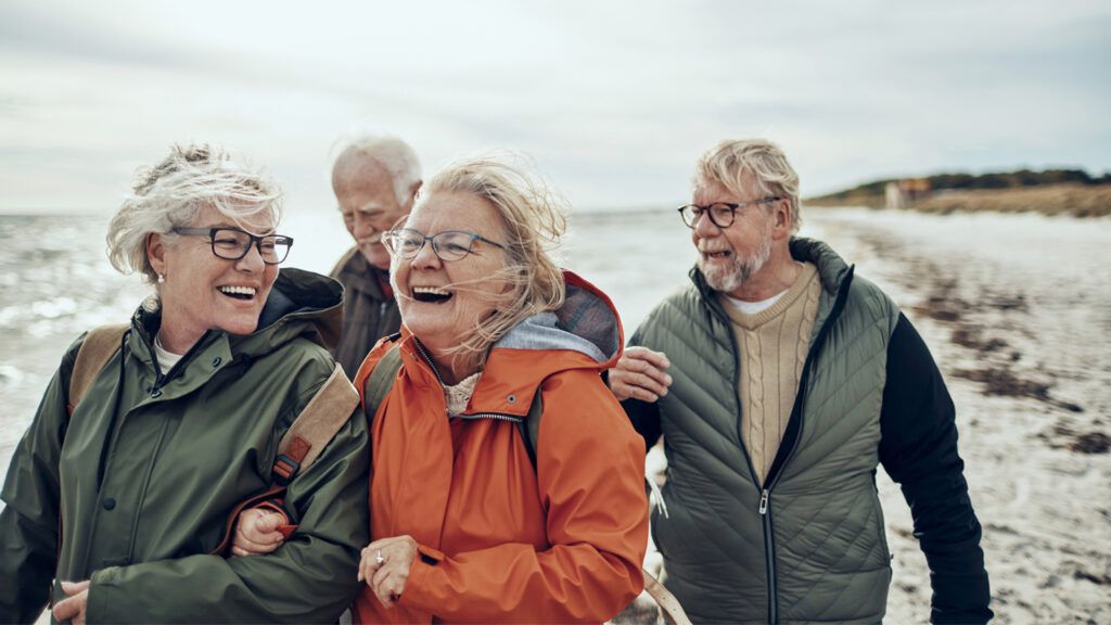 Retirees hiking together and having fun.