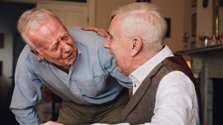 Senior friends laughing