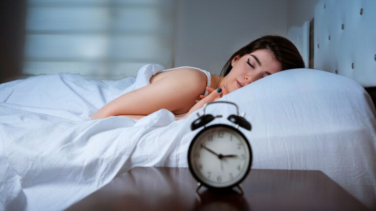 A close-up of a young girl sleeping.