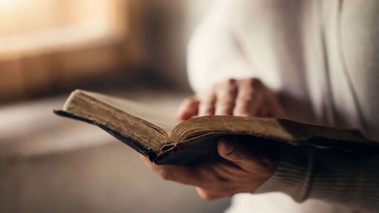 Woman holding a bible