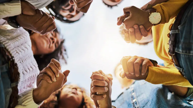 Diverse women standing together in unity.