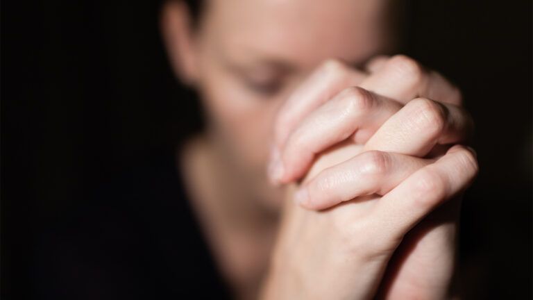 A woman prays