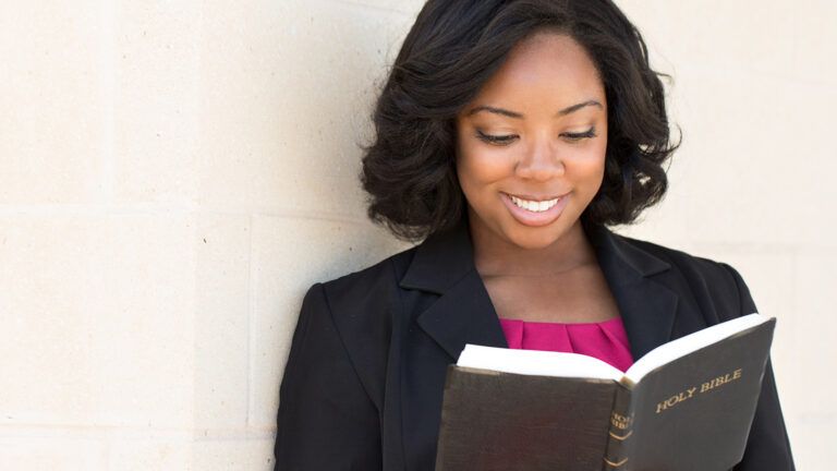 A woman reads the Bible